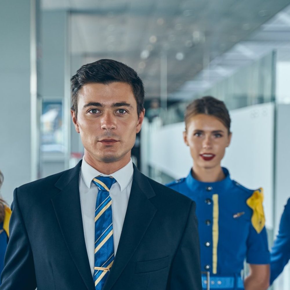 young-cabin-crew-posing-for-the-camera-indoors-e1630902153104.jpg